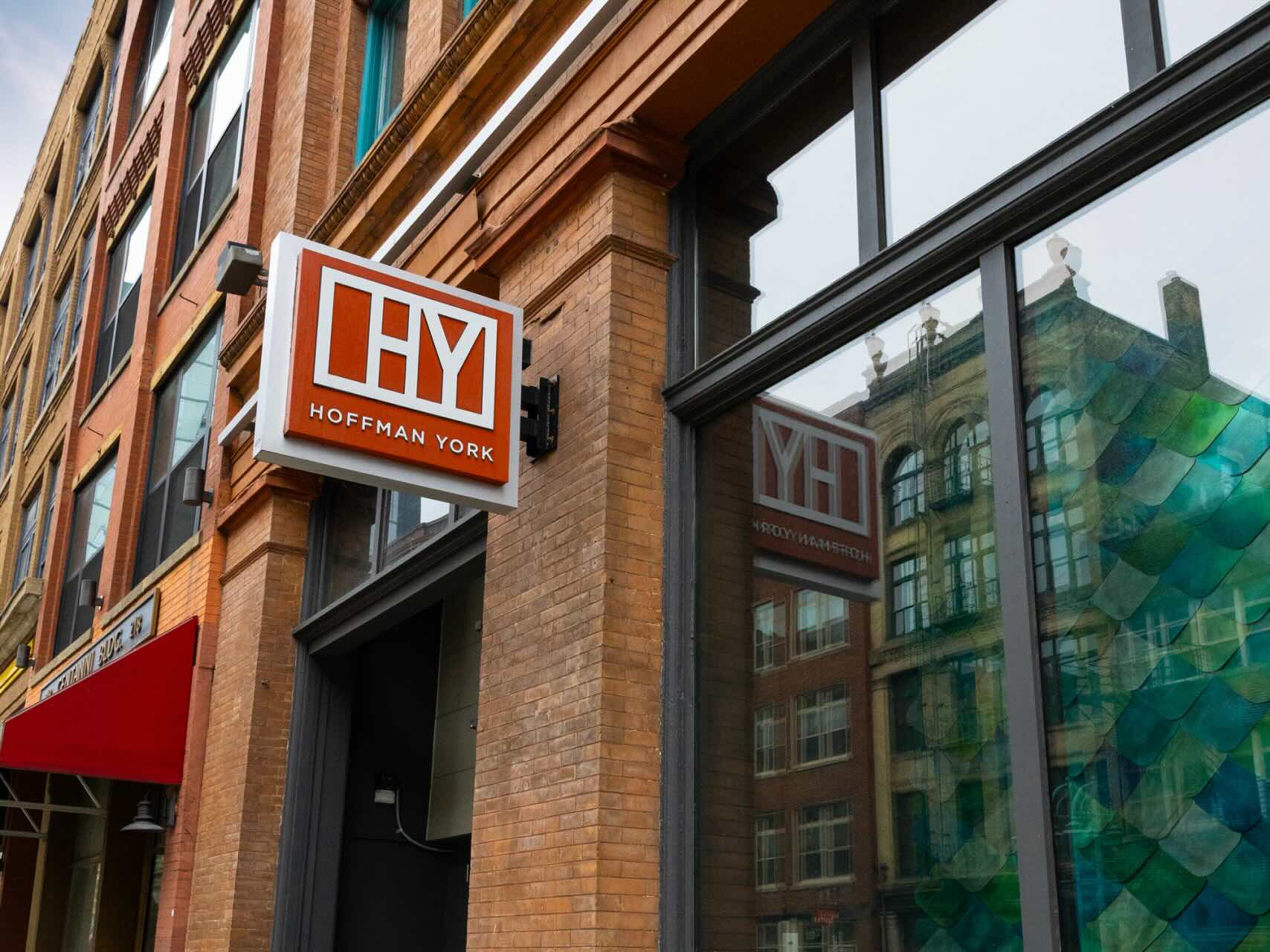 HY sign in front of the Hoffman York office building.